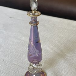 Vintage handmade Egyptian glass perfume bottle with gold accents.