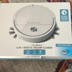 New Brookstone Robotic Vacuum 