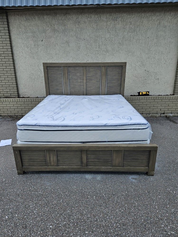 King-size Cindy Crawford's solid wood Bed Frame with Brand new king size Pillow Top Mattress and box spring in plastics
