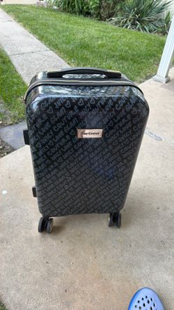 Juicy Couture Rolling Carry On Luggage