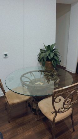 Elegant Glass Top Dining Table with 4 Chairs – Ornate Metal Base