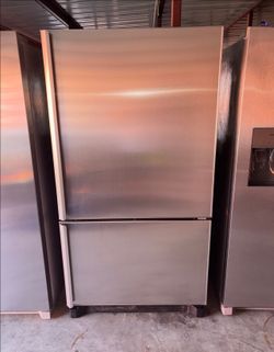 Amana Stainless Steel Refrigerator And Freezer