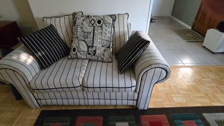 TWO striped sofas with cushions- MUST GO