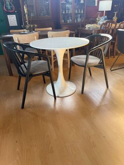 Small Tulip Dining Table With Beautiful solid Black Oak Dining Chairs