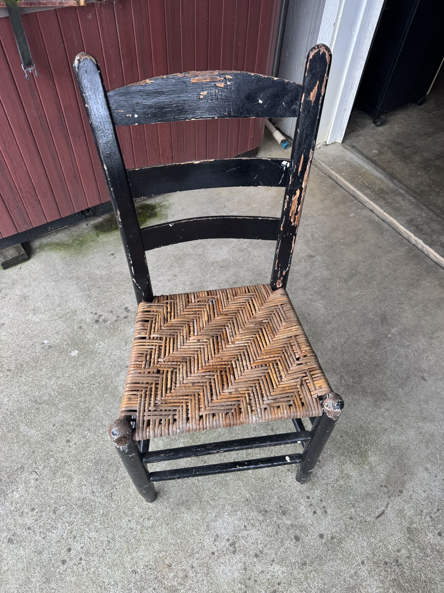 Wooden chair with wicker seat