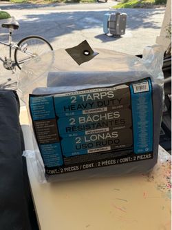 12x16ft blue tarp. Two pack. Never used still in Packaging
