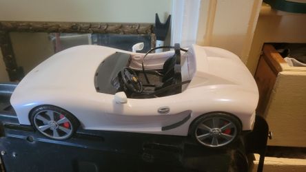 Rainbow high Barbie car.