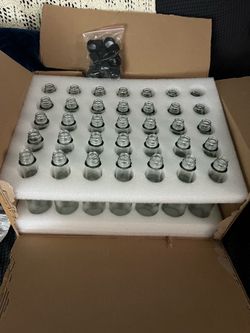 35 mini bottles with lids