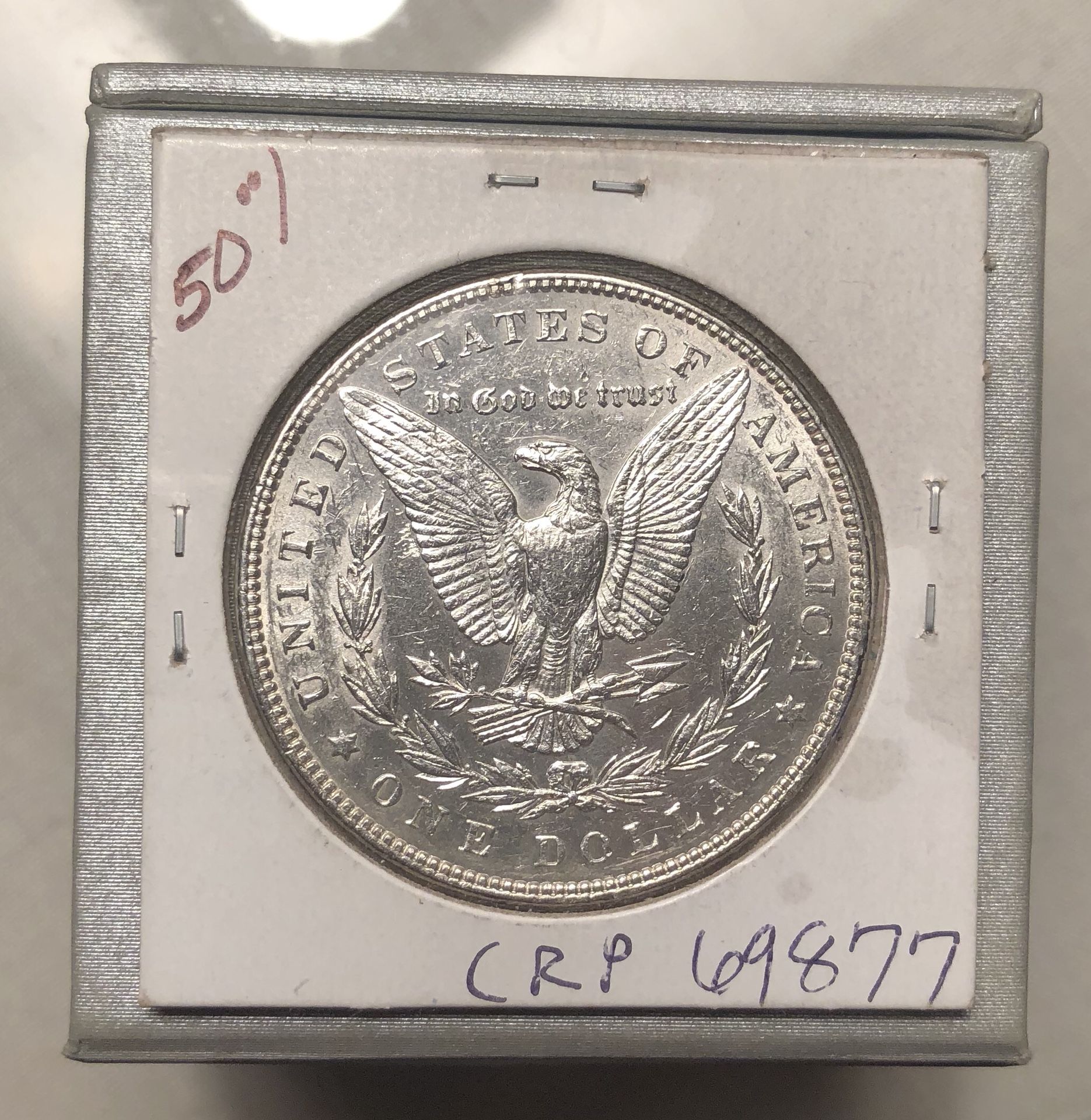 1886 and 1900 Morgan Silver Dollars