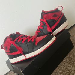 Black and Red Jordan 1 Mids