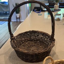 Set a three with her baskets