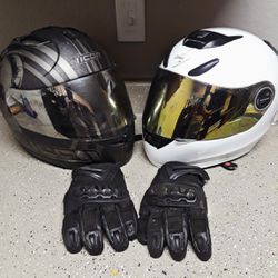 2 helmets and a pair of gloves