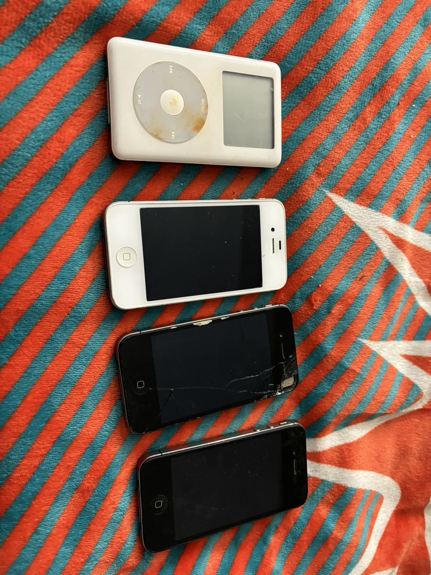 Broken I phone 5’s (3) and broken I pod classic (1) I phone 8 phone cases (2)