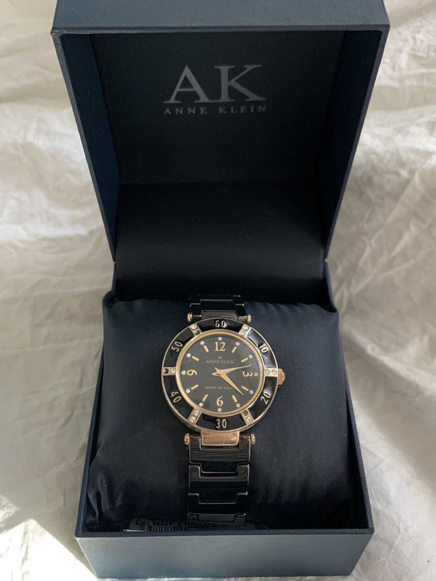 Anne Klein black and gold watch