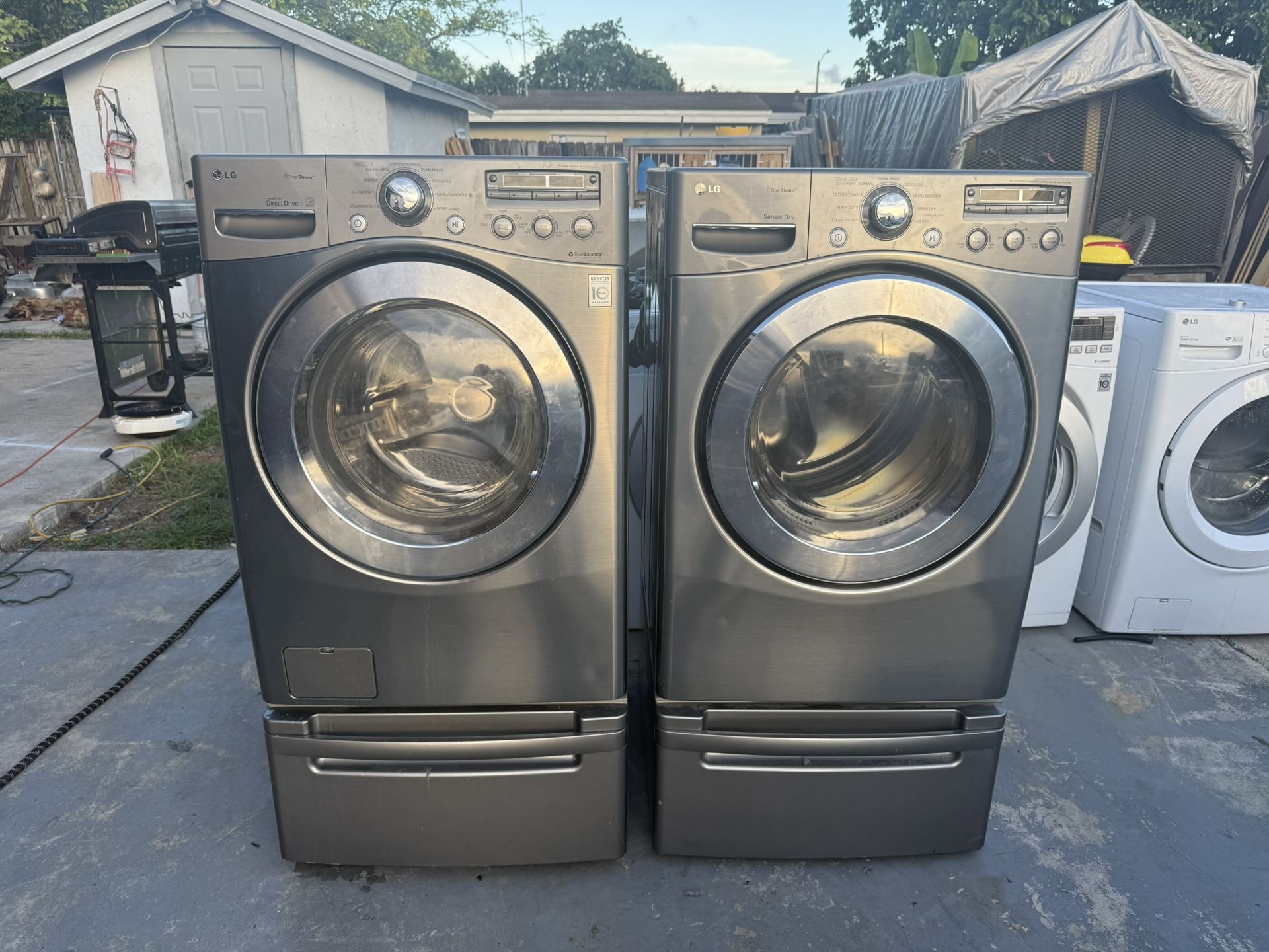 Lg Stainless Steel Washer And Dryer With Pedestal