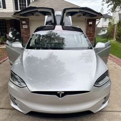 Tesla Model X 75D  Texas rebuilt title.
