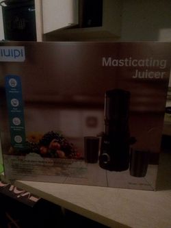 Masticating juicer