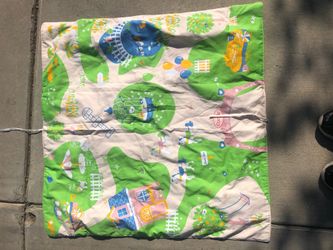 Cute little play mat that turns into a backpack for a little girls