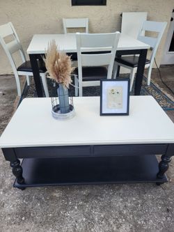 Coffee table with rising top