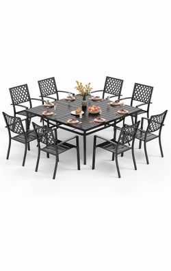 Nine pcs patio set with 60 inch table and umbrella stand and eight chairs used inside outdoor screened in patio
