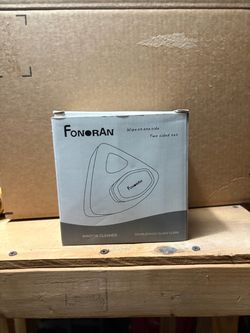Fonoran brand magnetic window cleaner designed to clean both sides of a window at once.