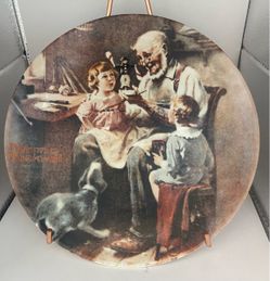 This is a vintage 1977 collector plate titled "The Toy Maker" from Norman Rockwell's Heritage Collection