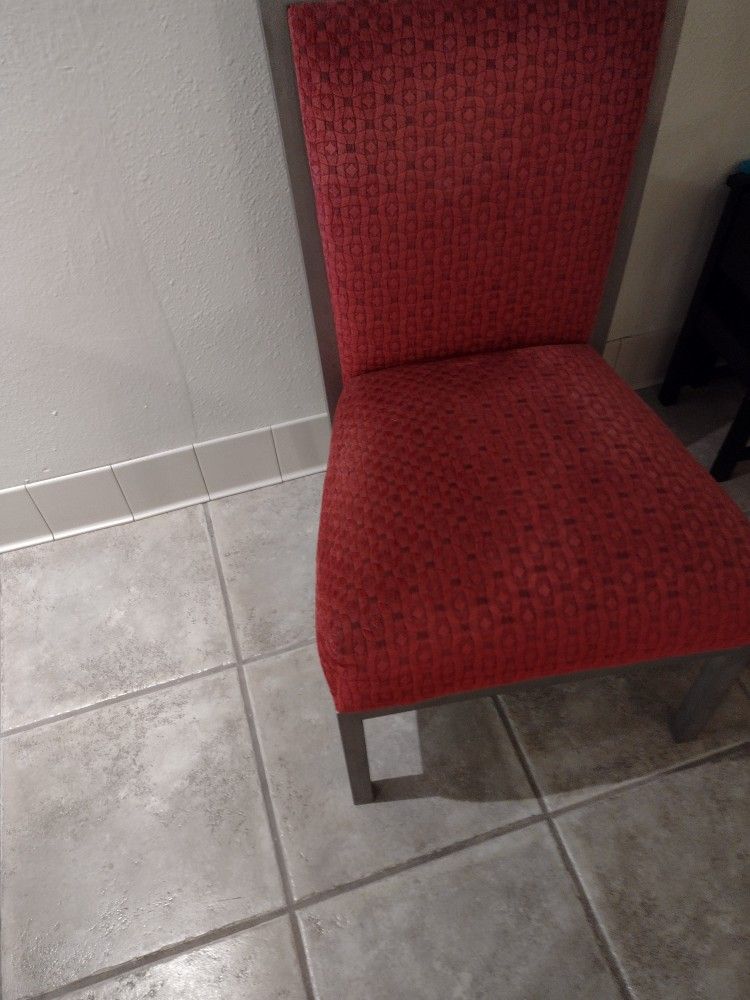 Three Matching Red Chairs