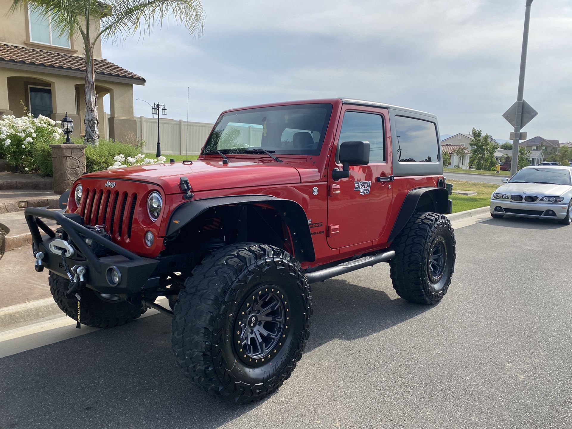 2015 Jeep Wrangler Jk low miles like new with 37s and 4 inch lift