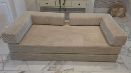 Convertible floor sofa bed.
