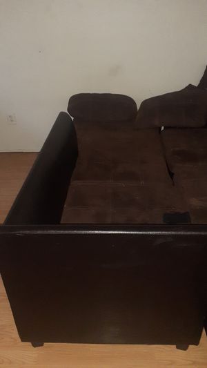 Photo Brown small sectional couches 8 months old no rips you need to clean them just a little all the pillows are there