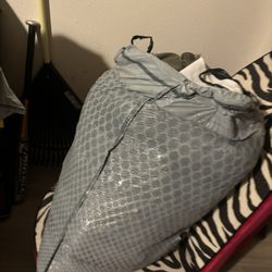 2 large bags of assorted clothing in medium size (maximum 40 pieces) and a pair of lightly used NB size 5.5 tennis shoes And Two  Handbags