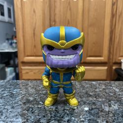 Vinyl Toy Funko Pop! Marvel Christmas Sweater Thanos Bobblehead.  Approximately 5 inches tall.  Preowned.  Has been on display in a cabinet with a lar