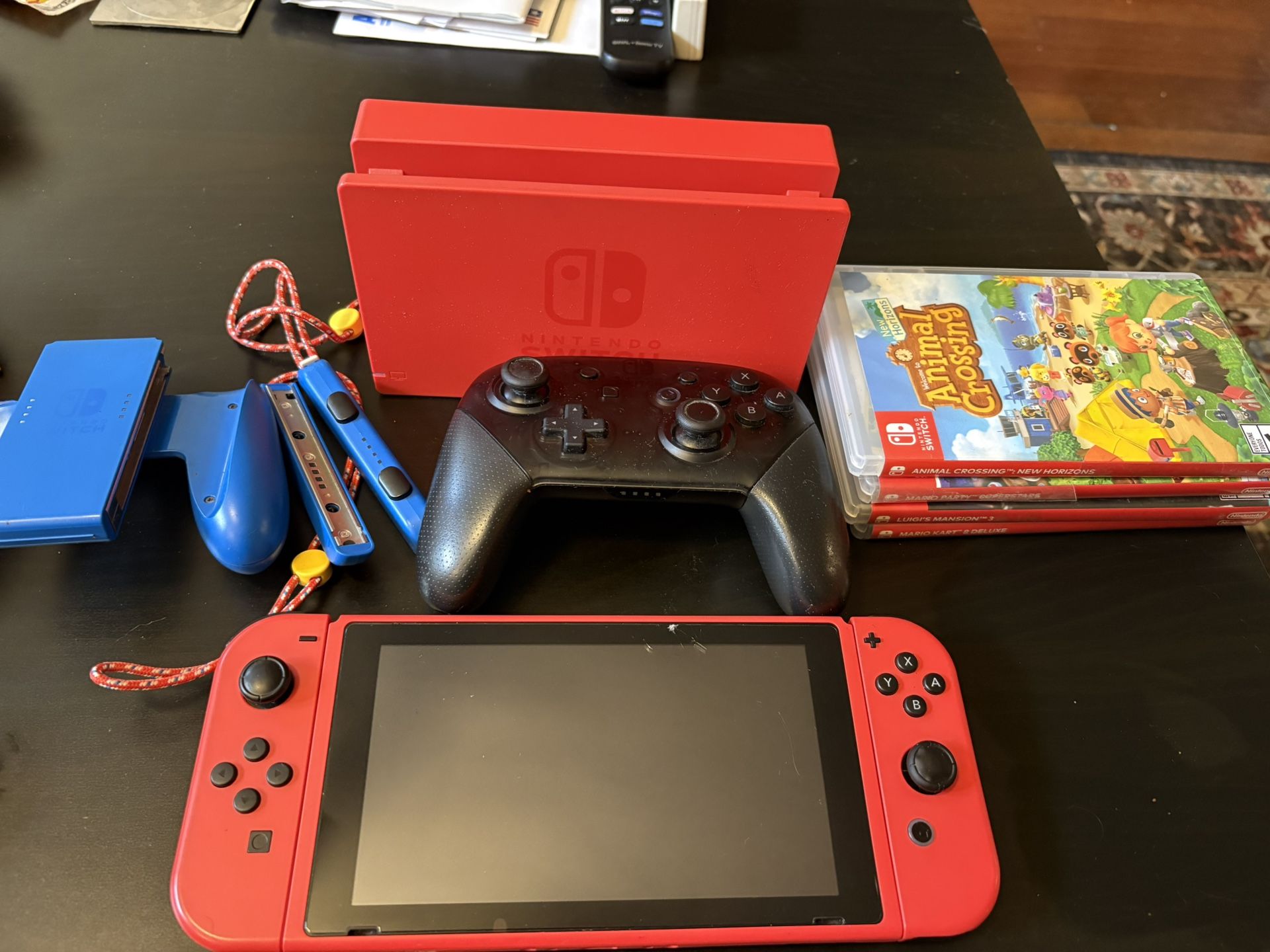 Limited Edition Mario Red Nintendo Switch (32 GB) Bundle - 5 Top Games!