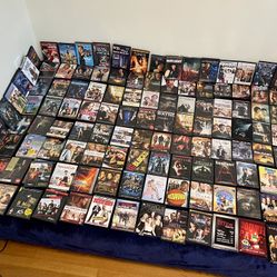 120 DVDs  + DVD player  $ 60