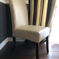 Set of TWO cream colored dining chairs