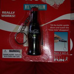 1999 Vintage Coca-Cola Keychain With Disappearing Cola