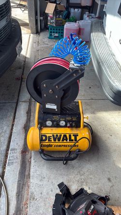Air compressor and reel hose. The hose need to be replaced
