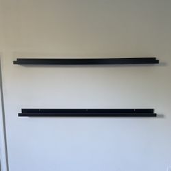 A Set Of Art Pieces Display Shelves