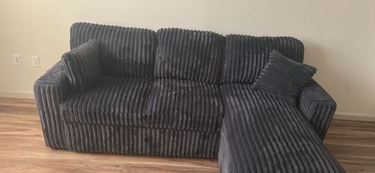 Brand new couch also has storage and pulls out
