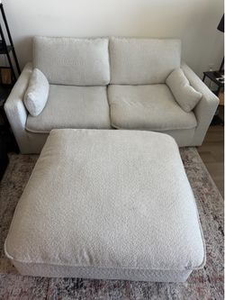 White couch with ottoman