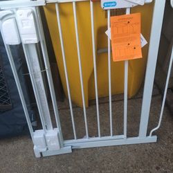 Brand new metal Walk through safety gate with extension kit only $40 firm