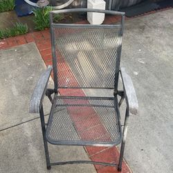 A Set Of Two Fold Up Medal Patio Chairs 