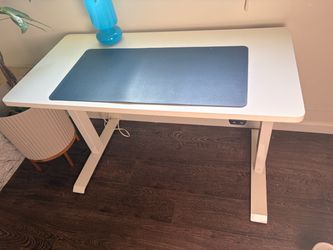 Adjustable height desk (48inch x 24inch)