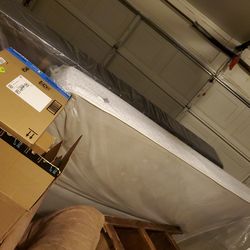 Queen bed. Mattress, box springs, and frame