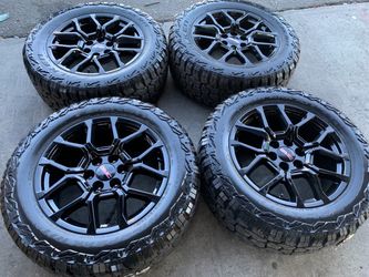 20” Brand new oem gmc Chevy factory rims with falken RT off road tires 6 lug