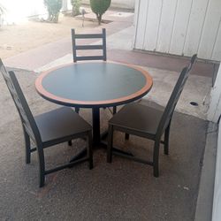 TABLE AND THREE  CHAIRS 