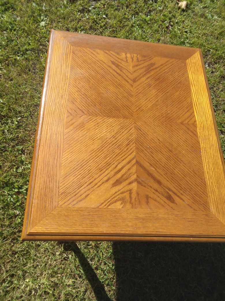 A Brown End Table With Drawer And  4 Blue Metal Chairs  All For 40.00