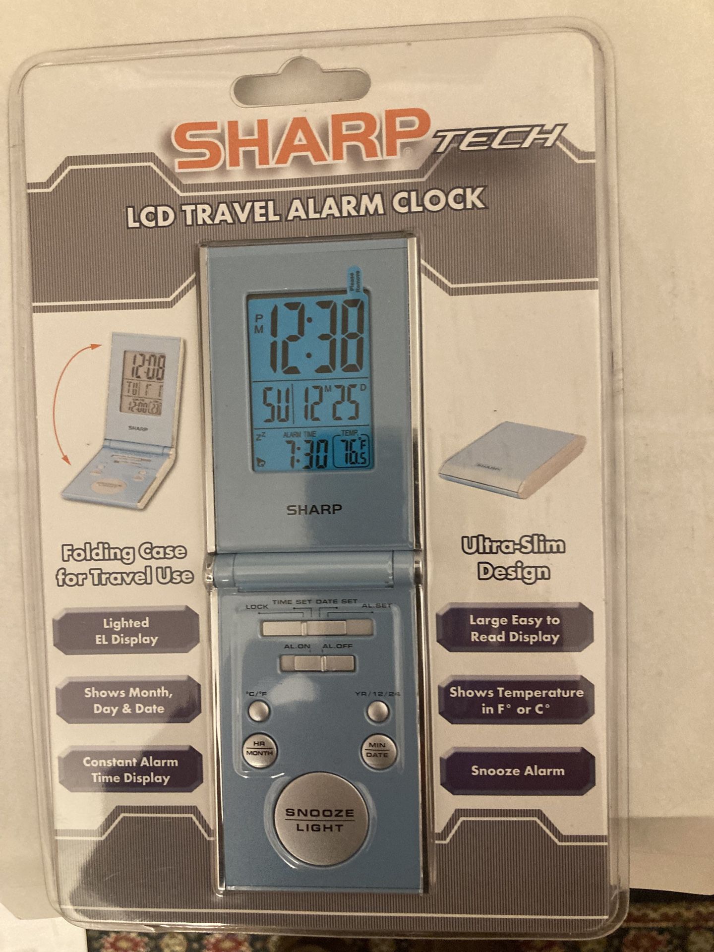 Sharp LCD travel alarm clock.