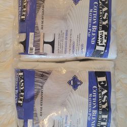 2 New Twin Mattress Pads
