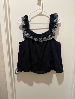 Black off the shoulder tank rop